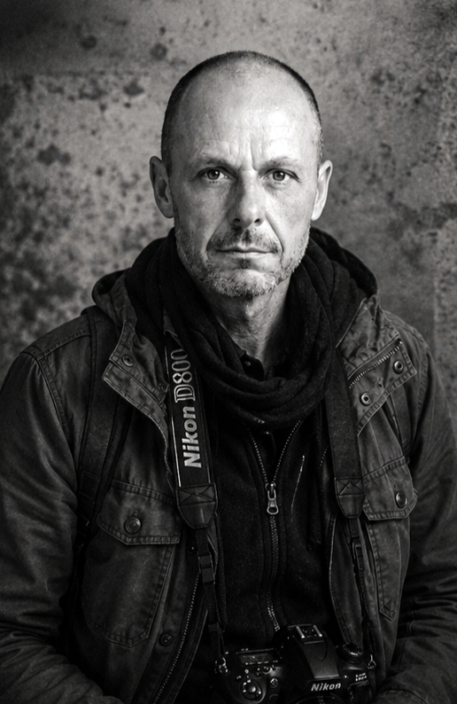 Dejan Petrović holding his camera