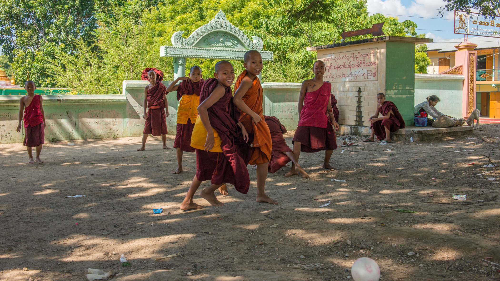 A Game in the Shaded Courtyard — Myanmar