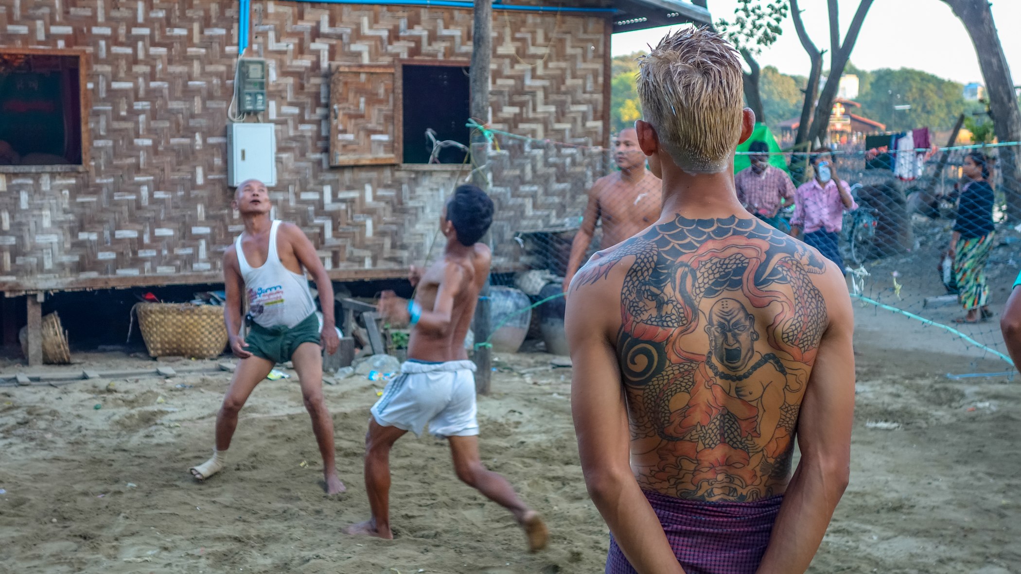 A Game Outside the Woven House — Myanmar